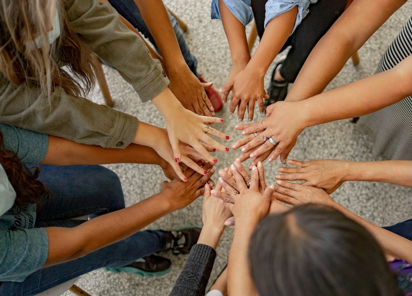 Team hands together